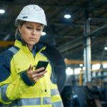 worker checking phone